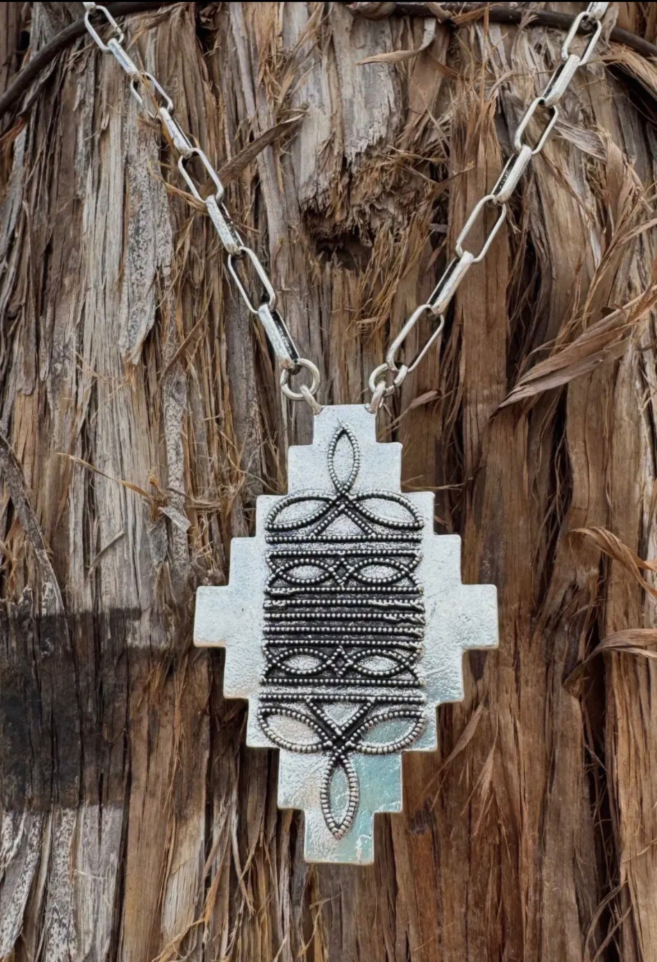 Boot stitch necklace